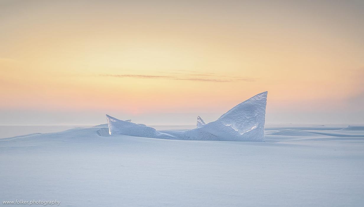 Magic sunset on frozen Lake Baikal